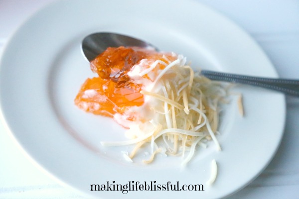 Retro Orange Jell-O with grated cheese on top