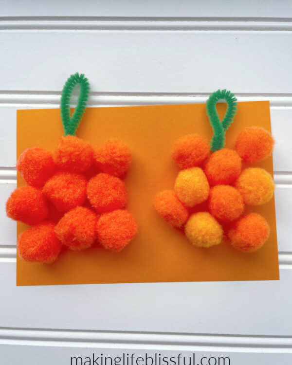 pumpkin-kids-craft-made-with-pom-poms